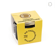 Lade das Bild in den Galerie-Viewer, Trüffel Honigtöpfchen von "Die Trüffelmanufaktur" im Schraubglas mit Pappbanderole.