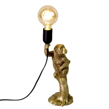 Lade das Bild in den Galerie-Viewer, Lampe in Form eines goldenen Affen, der eine Glühbirne in der Hand hält.