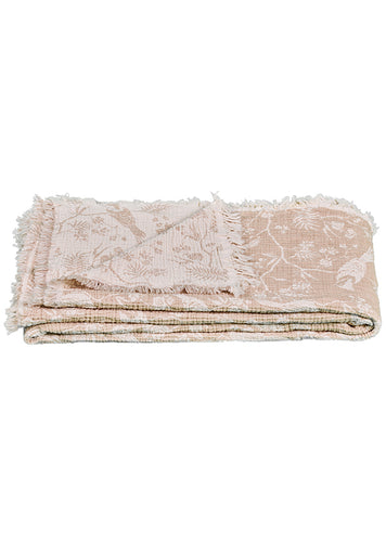 Musselin-Wohndecke mit Blatt- und Vogelmuster in beige und creme.