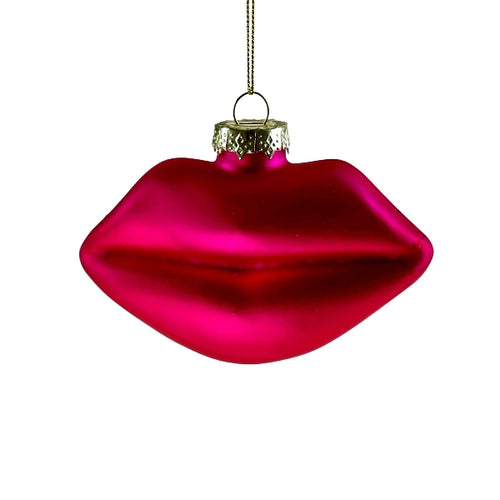 Weihnachtsbaumschmuck aus Glas in Form von Lippen. Der Kussmund ist matt-pink.