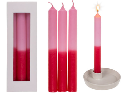 Dip-Dye-Kerzen mit Farbverlauf in rot und rosa.