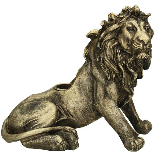 Kerzenhalter für Stabkerzen in Form eines goldenen Löwen.