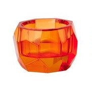 Teelichhalter aus orange-transparentem Glas in geschliffener Kristall-Optik.